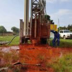 Pumping and piping the borehole